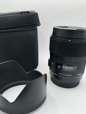 Sigma 35mm f/1.4 DG HSM Art Lens • Brand New • Includes Original Hood and Pouch